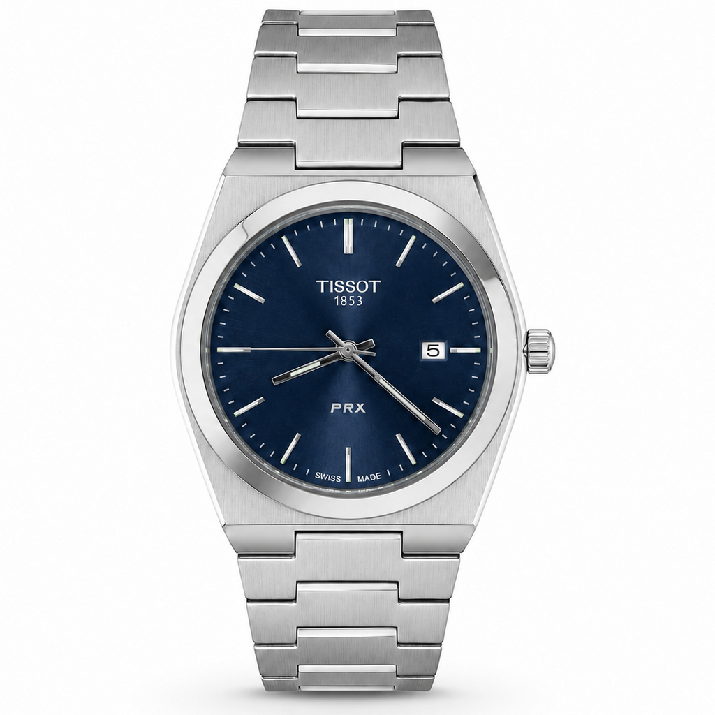 Tissot PRX watch with a stainless steel link bracelet, a silver-toned case, and a deep blue dial with a date window.